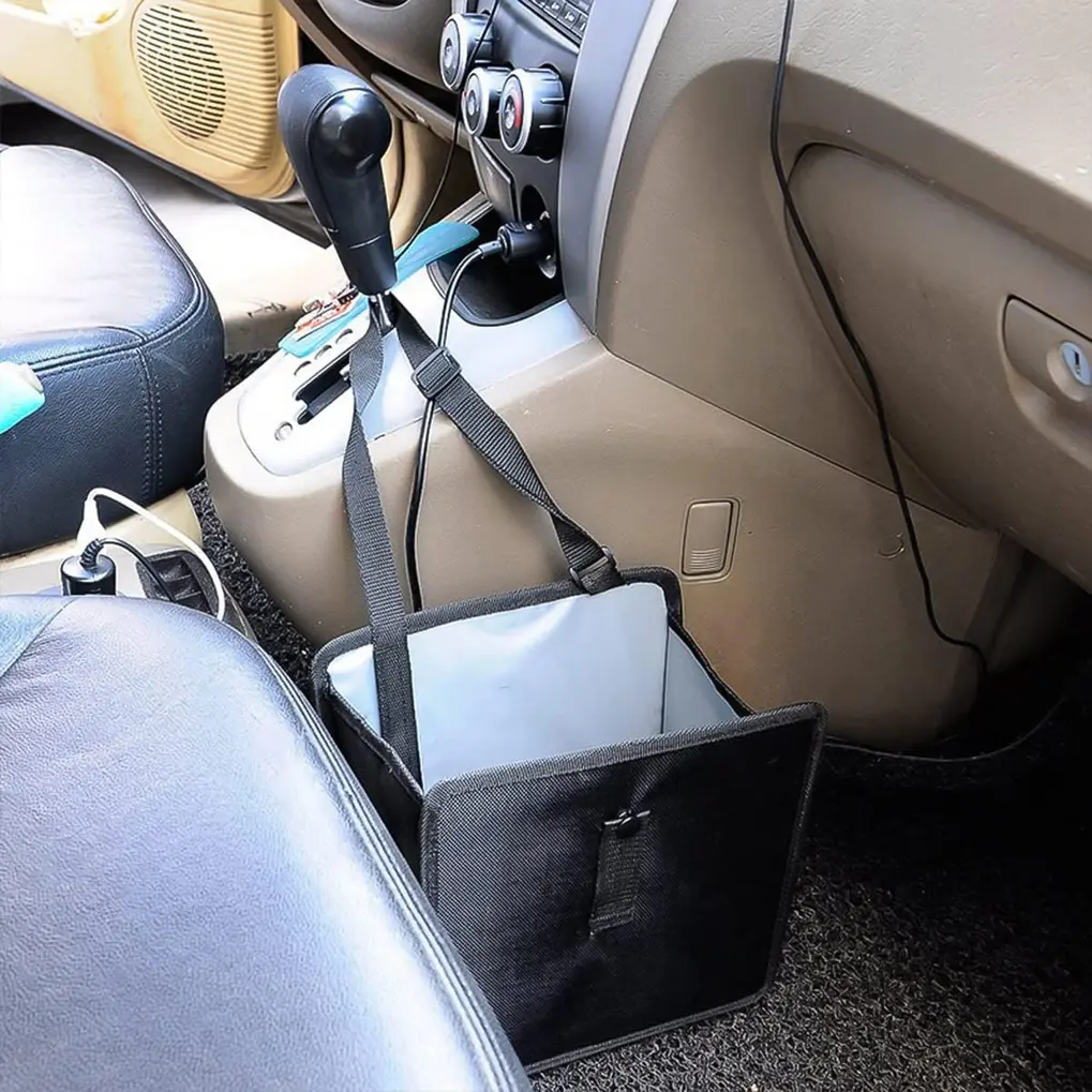 Fekey JF Foldable Car Trash Can folded flat next to a car seat