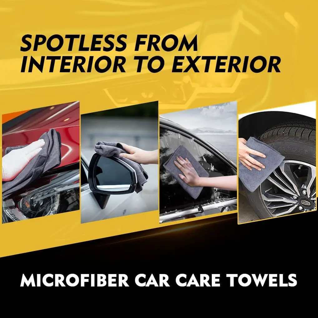 Folded grey microfiber cloths organized on a detailing mat with clips for different cleaning tasks