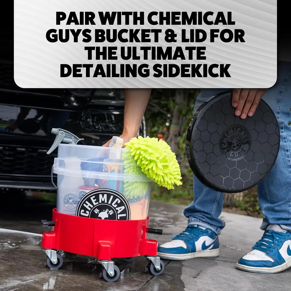 Chemical Guys Creeper Rolling Bucket Dolly next to a car tire during a wash