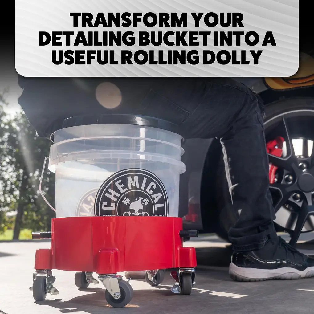 Close-up of the caster wheels and locking mechanisms on the Chemical Guys Creeper Rolling Bucket Dolly