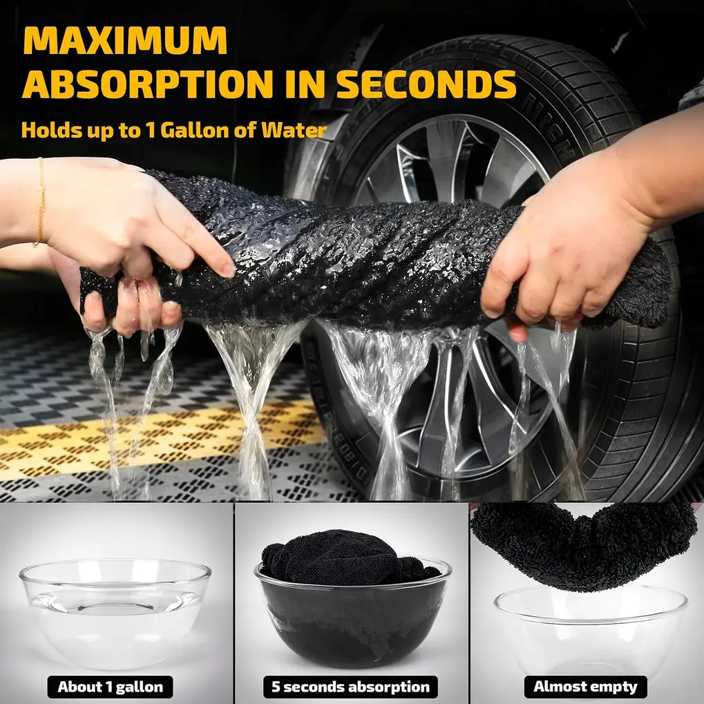 Hand holding a thick gray SMINDER 1200 GSM microfiber car drying towel