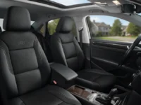 Car interior featuring black Skechers Memory Foam Seat Covers with visible 'S' logo.