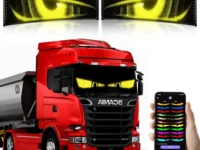 Two GOTUS LED Eyes flexible LED matrix panels mounted inside a truck windshield with USB cable routed along the pillar