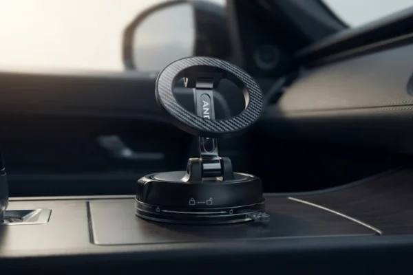 Image in a new AI-generated scene - Compact Foldable Car Phone Holder for Magsafe